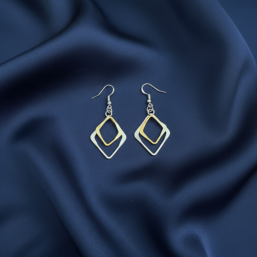 Ruby & Marcasite Teardrop Earrings on navy silk