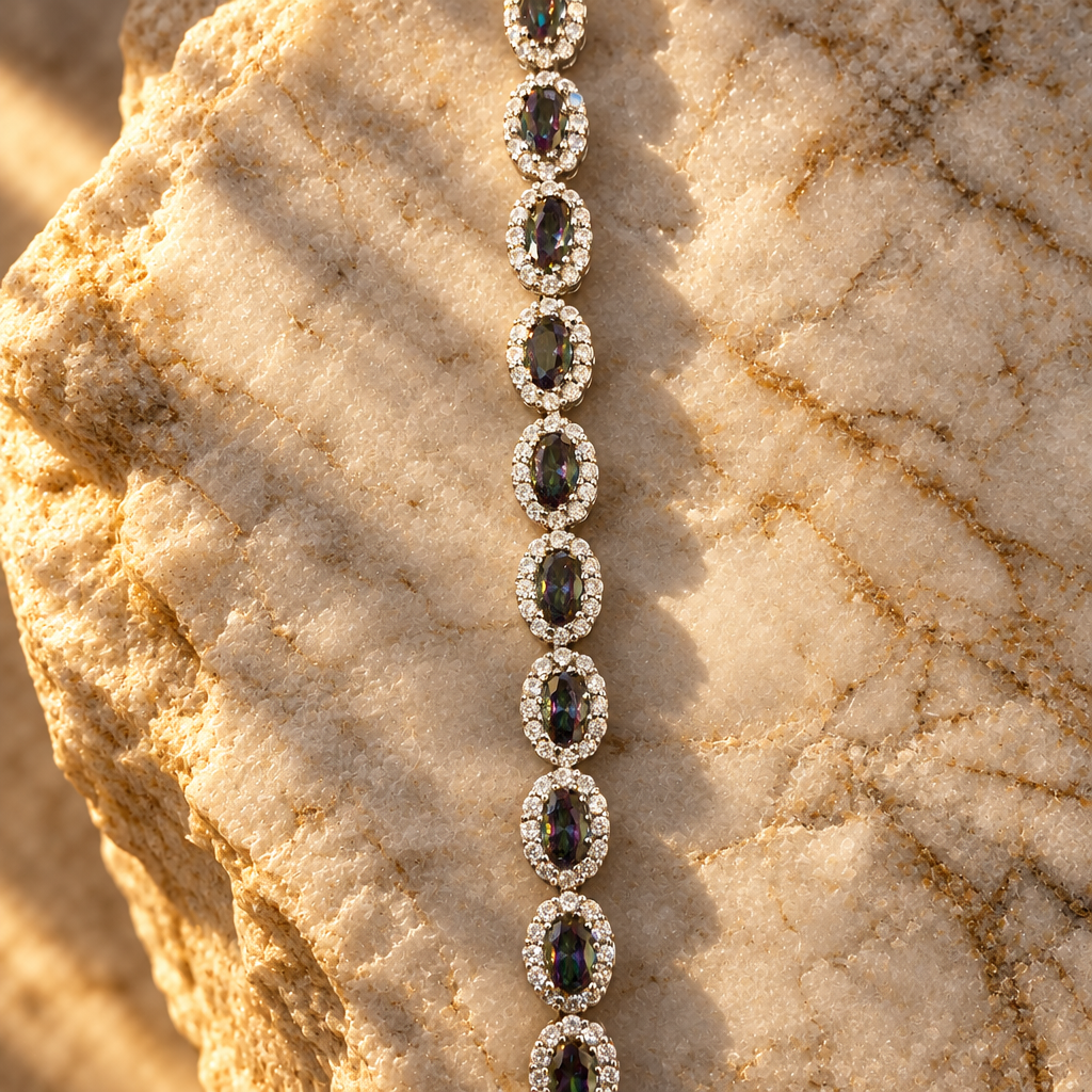 Tennis bracelet on marble, golden-hour
