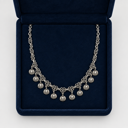 Tulip charm necklace in navy velvet box, simplified