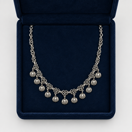 Tulip charm necklace in navy velvet box, simplified