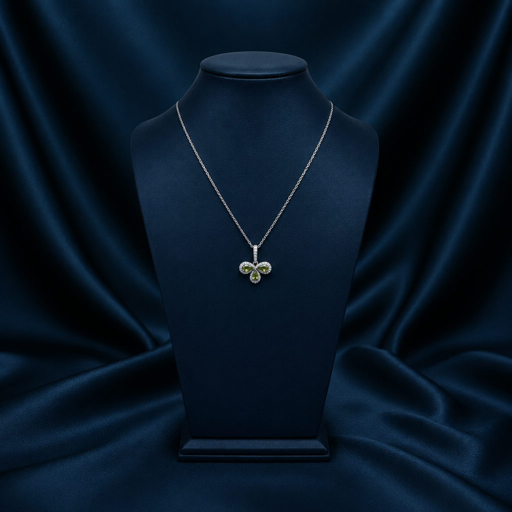 Zircon trefoil necklace on bust, scale matched to model shot