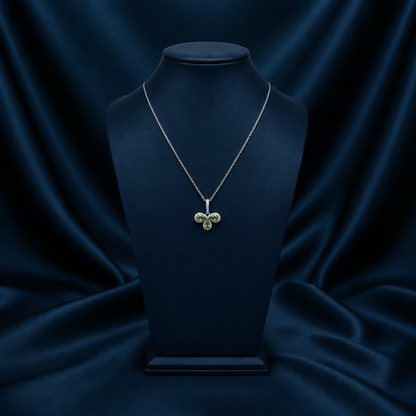 Zircon trefoil necklace on bust, scale matched to model shot